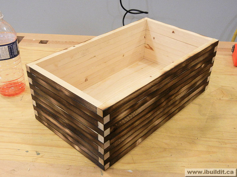 box built like a log cabin